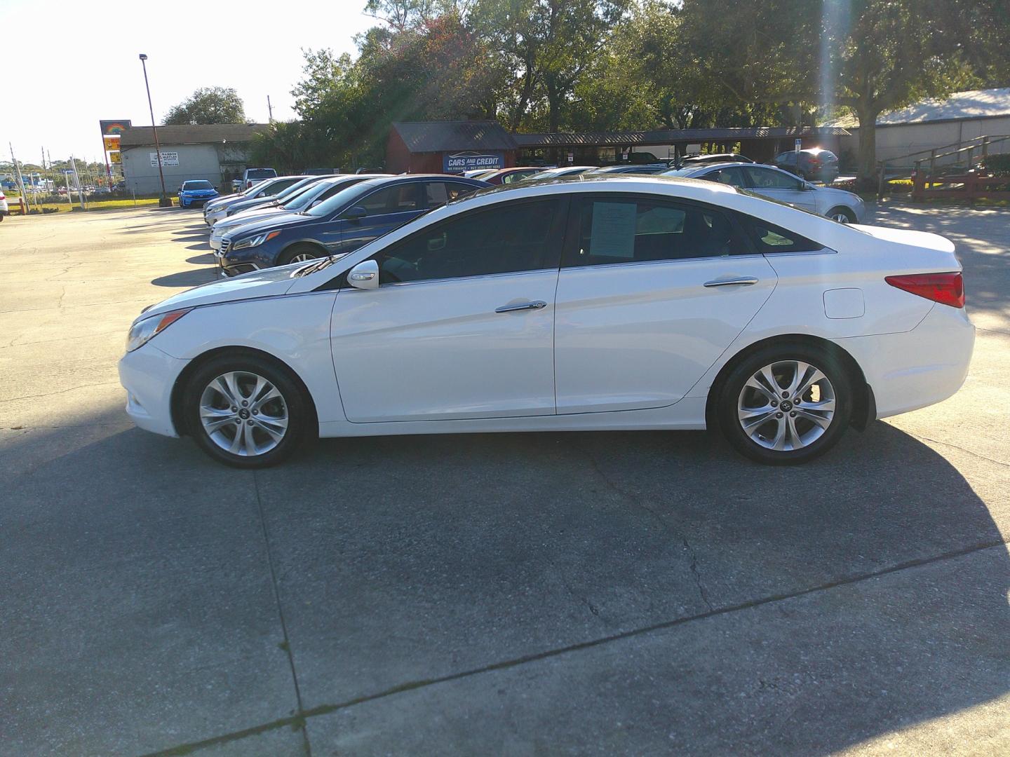 2013 WHITE HYUNDAI SONATA LIMITED; SE (5NPEC4AC9DH) , located at 1200 Cassat Avenue, Jacksonville, FL, 32205, (904) 695-1885, 30.302404, -81.731033 - Photo#1